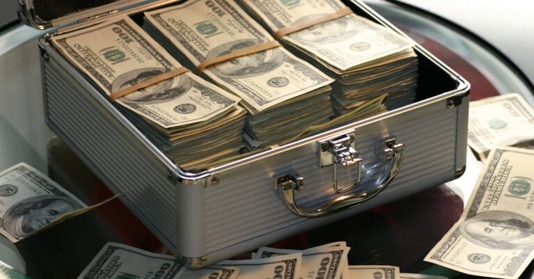 Hard Cash on a Briefcase - How to make your first 100k Dollars