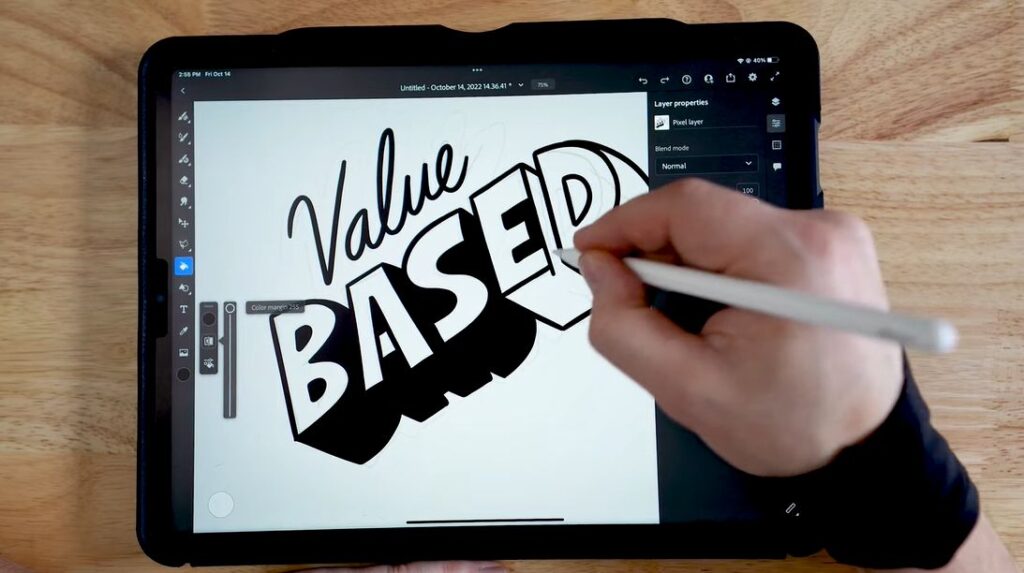 a person doing illustration project on iPad